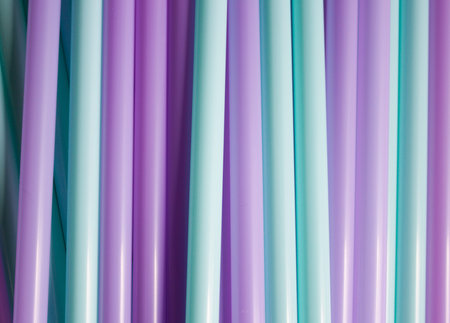 Electric lilac and mint plastic straws background. Set for party.