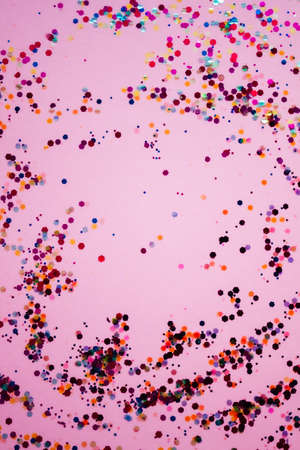 Pink festive background with sparkles. Flat lay style.の写真素材