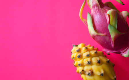 Dragon fruits pitahaya on neon pink background.の写真素材