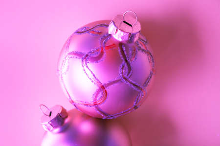 Christmas balls in vibrant lilac pink gradient holographic color. Concept art. New Year futurism.の写真素材