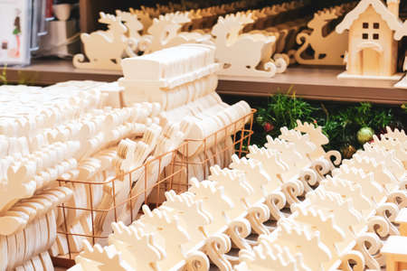 Christmas festive styled wooden toys and decor on market. Winter holidays concept.の写真素材