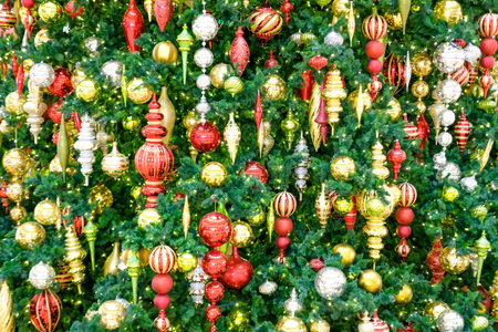 Christmas tree with many beautiful ornaments background. Winter holidays concept.