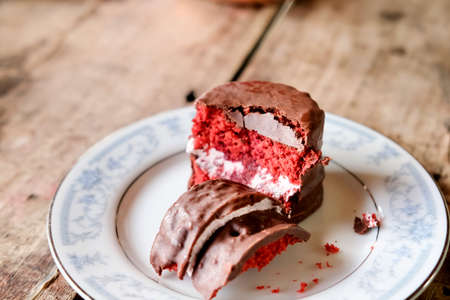 Red velvet cake on wooden table. Classic desserts concept.の写真素材