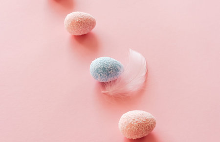 Creative Ester layout. Colorful mini pink and blue artificial eggs. Spring holidays concept.