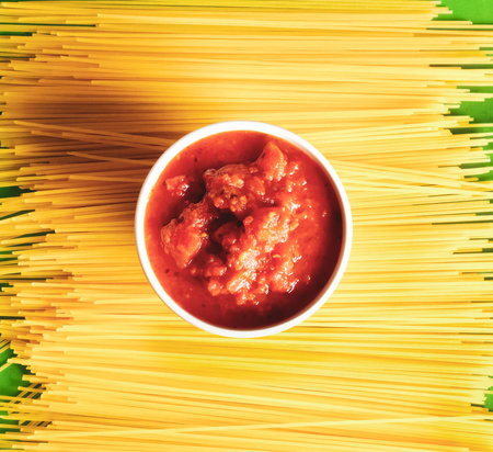 Gluten free Italian spaghetti and homemade tomato sauce with basil and garlic.の写真素材