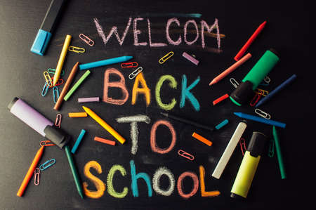 Back to school, the concept of parenting. The inscription on the blackboard colored chalk.の写真素材