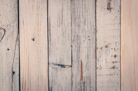 white wooden boards with scratches and knots. Aged background under the style of rustic. Copy space. Layout for design.の写真素材