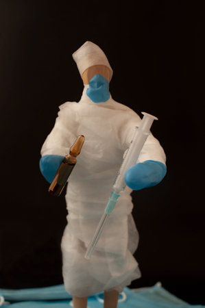 The global epidemic of coronavirus.man in protective medical uniform is holding antibiotics from...