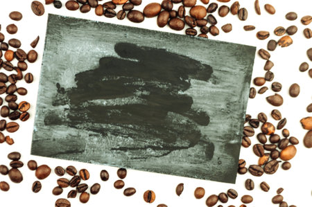 Shopping cart with coffee beans on a white background. Top view, isolate. Concept of the coffee industry.の写真素材