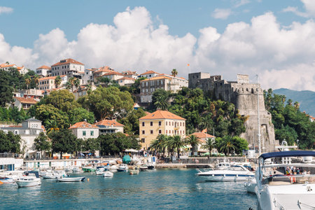 Herceg Novi,Montenegro-July 21,2021:View from a boat in the port to Herceg Novi.Yachts are moored in...