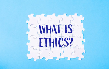 Phrase on white puzzles What is ethicsの写真素材