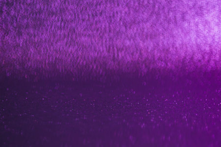 A purple backdrop featuring a blurred purple line, adding a touch of elegance and intrigue to the...