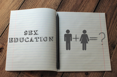 A man and a woman are shown on a piece of paper with the words Sex Education written below themの写真素材