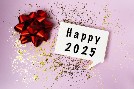 A cheerful greeting card celebrating the start of 2025 with bright decor and festive touchesの写真素材