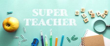 Green background with a picture of an apple and a bunch of pens and pencils. The words are written...