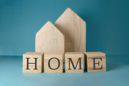 A stack of wooden blocks with the letters HOMEの写真素材
