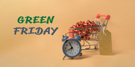 Shopping cart with a clock on it and the words written below it. Concept of urgency and the importance of shopping sustainably on this dayの写真素材