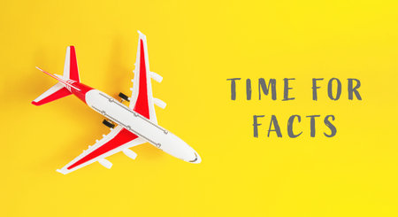 Airplane model positioned on bright yellow backdrop, accompanied by text that emphasizes facts and...