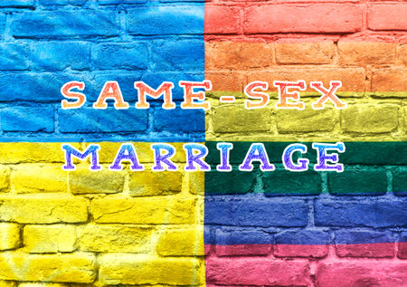 Colorful brick wall with the words Same Sex Marriage written on it. The image is meant to convey the idea of equality and acceptance for all individuals, regardless of their sexual orientationの写真素材