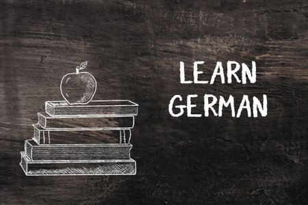 Stack of books illustrated with a chalk drawing of an apple on top, alongside bold text encouraging...