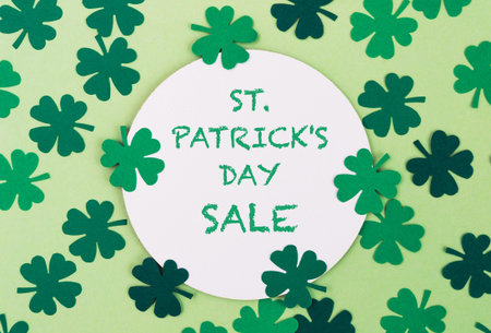 Green background for March 17 to St. Patrick's Day with green clovers. Template for design
