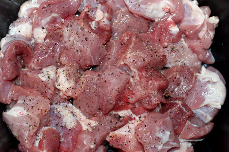 sliced fresh raw pork meat in the spices for semi-finished products with nutrient protein fatの写真素材