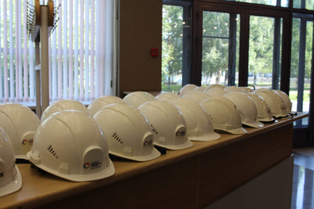 Russia, Novosibirsk 08/10/2019: protective helmets for workers are at the factory for builders