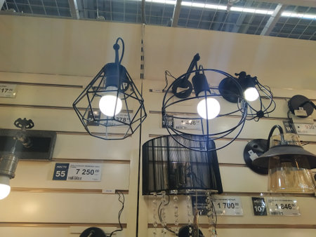 Russia, Novosibirsk 10.09.2019: electric lamps chandeliers with lamps for lighting exhibition in the shop windowのeditorial素材