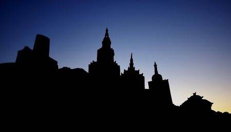 silhouette of city against night skyの写真素材