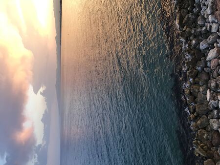 Expanse of the sea against the sunset sky. Beautiful seascape. Natural compositionの写真素材