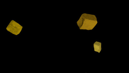 golden cubes on a black background, 3d illustration, computer generated imagesの写真素材