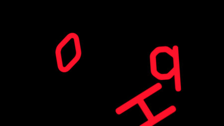 Blurred image of red light on black background.の写真素材