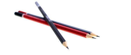 Red , gray and black drawing crayon isolated on white backgroundの写真素材