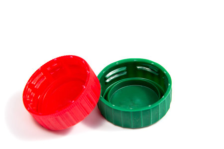 Colorful plastic bottle caps isolated on white background.の写真素材