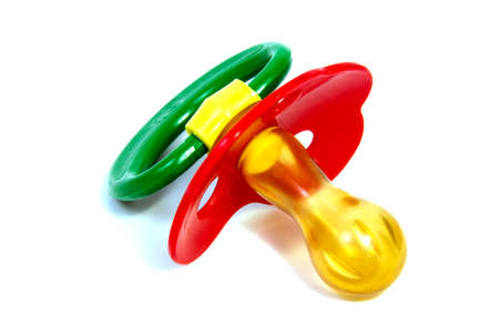 Studio shot of single pink baby pacifier dummy isolated on white backgroundの写真素材