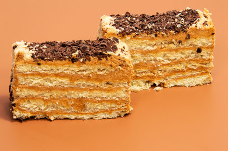 biscuit Swiss roll isolated on brown background