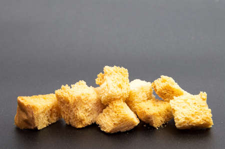 Croutons isolated on black background.の写真素材
