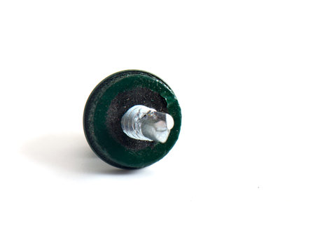 Macro shot metal nut isolated on white background. Chromed screw nut isolated. Steel nut isolated....