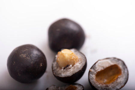 Nuts peanuts in chocolate glaze on a white background. selective focus,の写真素材