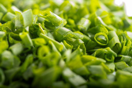 chopped green onions. Eds background is a green onion. Green Perya onion cut for freezing. Background from the cut bowの写真素材