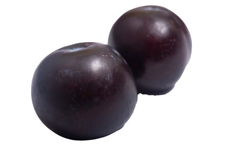 Plums on a white background ** Note: Slight graininess, best at smaller sizesの写真素材