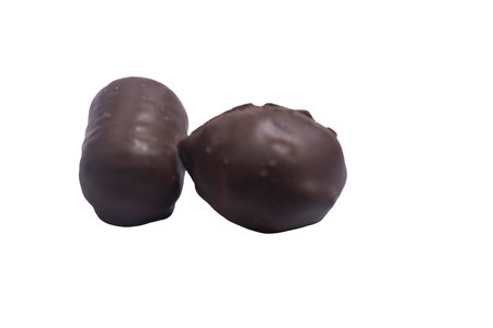 Chocolate bars with caramel and cookies on a white background. Front view on a chocolate bars,の写真素材