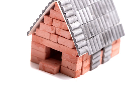 An old small house on a white backgroundの写真素材