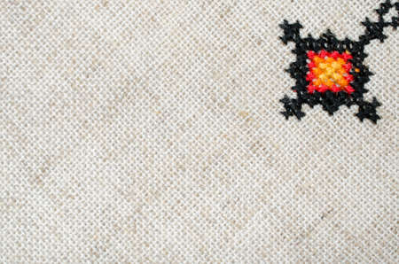 multicolored embroidered element on linen cotton threadsの写真素材