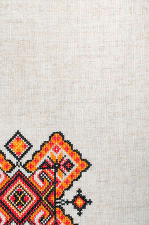 multicolored embroidered element on linen cotton threadsの写真素材