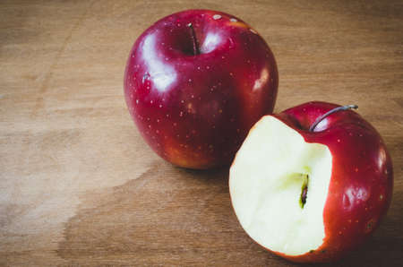 Fresh organic apples on rustic wooden background. Selective Focus. Rustic style.の写真素材