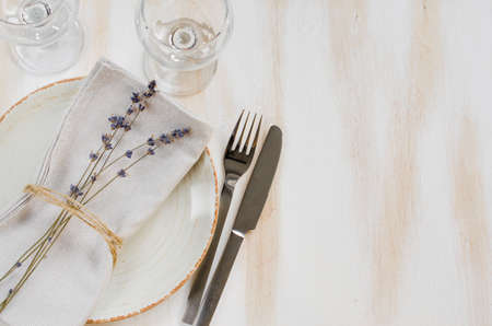 Festive table setting at vintage or provence style with lavender. Concept Birthday, Valentine's, Mother's or Father's Day. Closeup. Copy space, top view.の写真素材