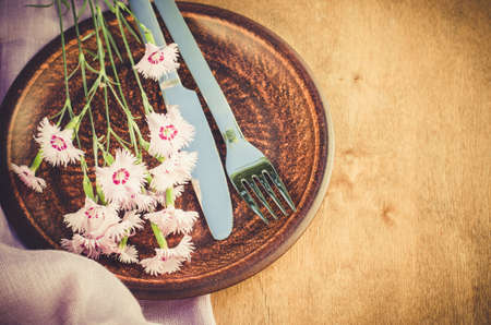 Festive table setting with flowers.の写真素材