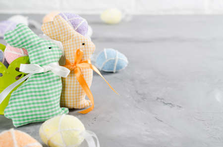 Happy Easter composition. Easter bunnies, eggs and tulips. Space for textの写真素材
