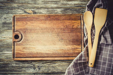 Culinary background with rustic kitchenware on vintage wooden table.の写真素材
